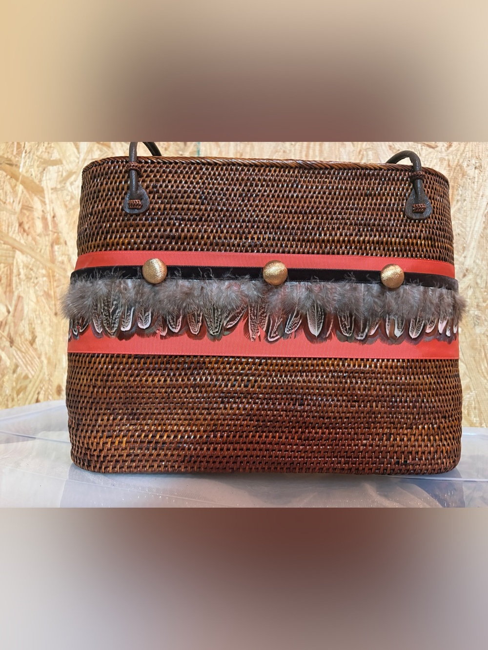 Lisi Lerch Woven Brown Straw Tote with Orange Trim and Feather Detail